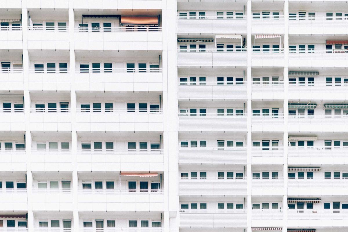 Apartment facade with rows of windows, the end use of window profile tooling